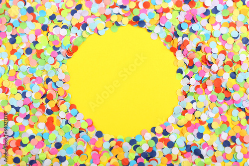 Confetti on yellow background