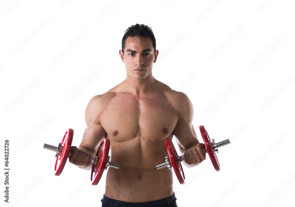 Muscular shirtless young man exercising biceps with dumbbells Muscular shirtless young man exercising biceps with dumbbells