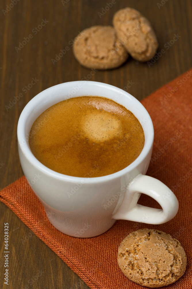 cup of espresso and biscotti, selective focus cup of espresso and biscotti, selective focus