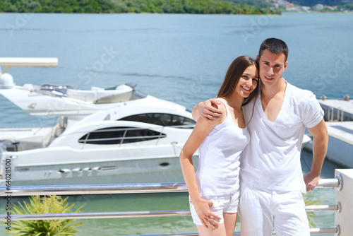 young couple on yacht