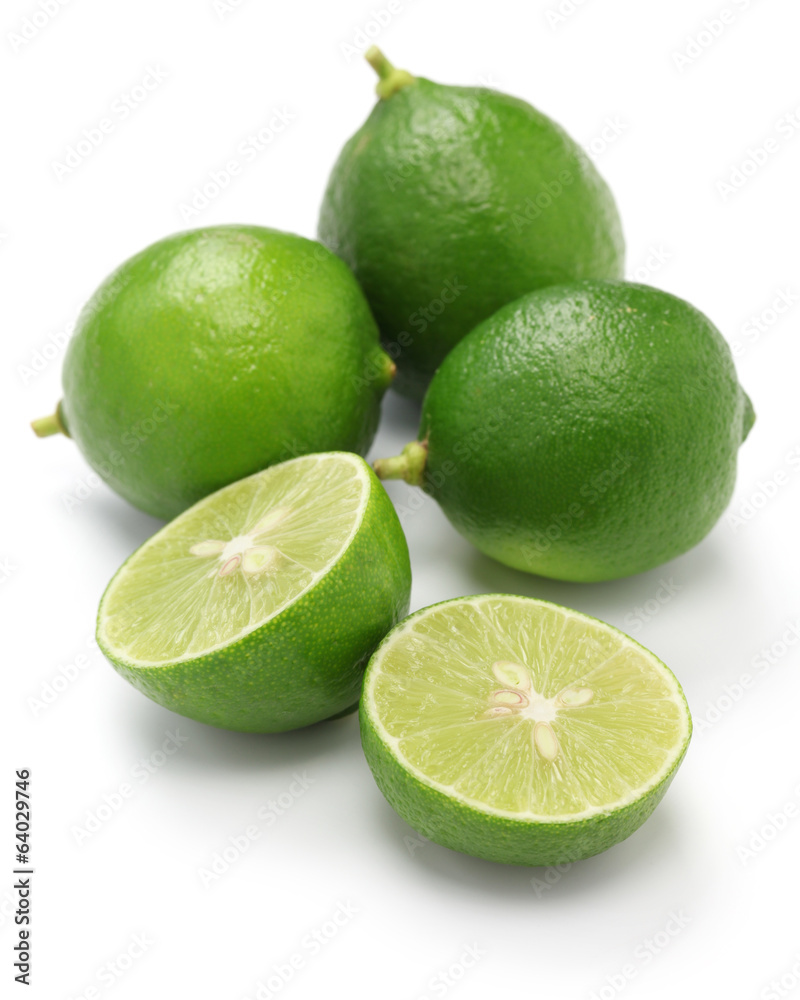fresh key limes on white background fresh key limes on white background