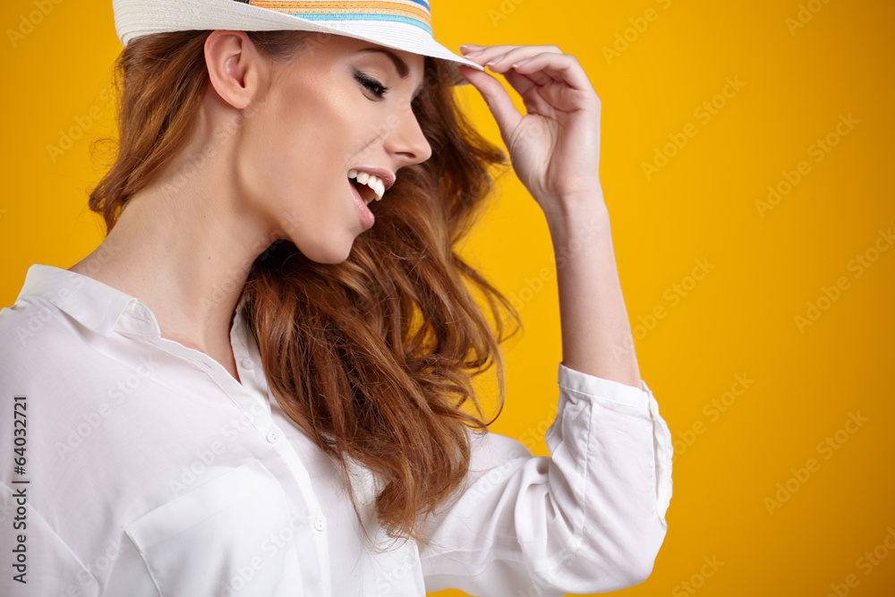 Portrait of a beautiful spring woman. Orange background Portrait of a beautiful spring woman. Orange background