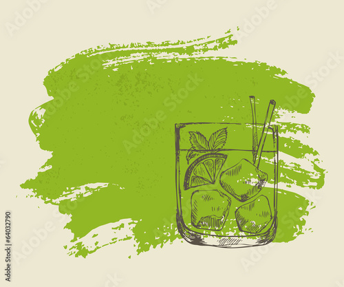 Iced tropical cocktail with mint on green grunge background
