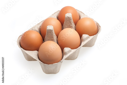 the six brown eggs isolated on white background