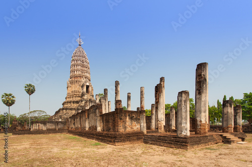 Sukhothai ruin old pagoda against blue sky at Wat Phra Sri Ratta