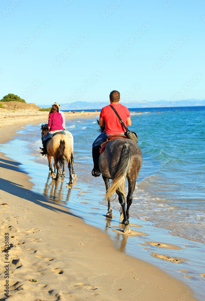 Tourists riding on the beach, summer vacation