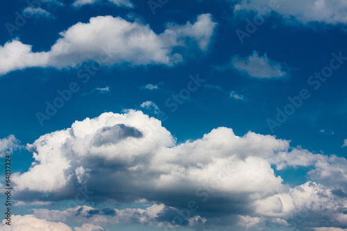 Set of white clouds over blue © Petkov