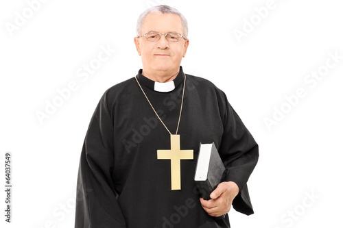Canvastavla Mature priest holding a bible