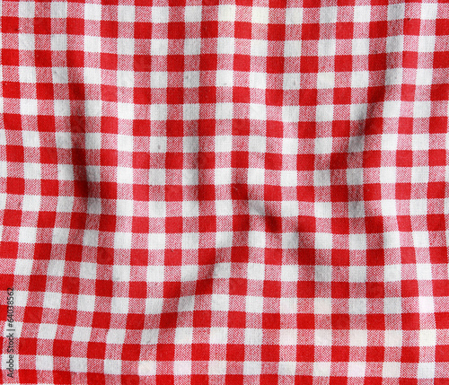 Texture of a red and white checkered picnic blanket.