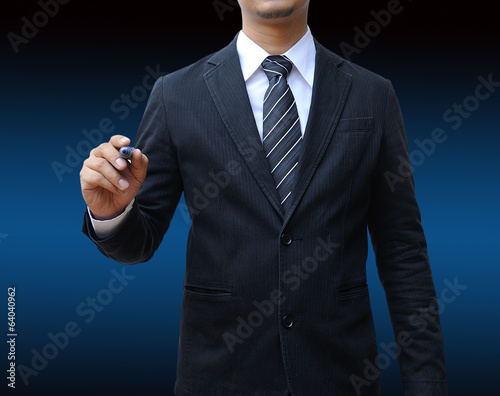 Businessman writing on the screen