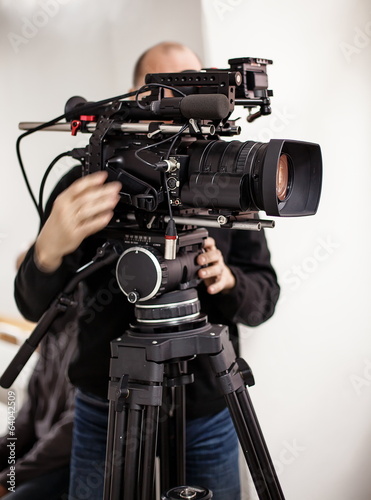 Videoperator shooting a reportage photo