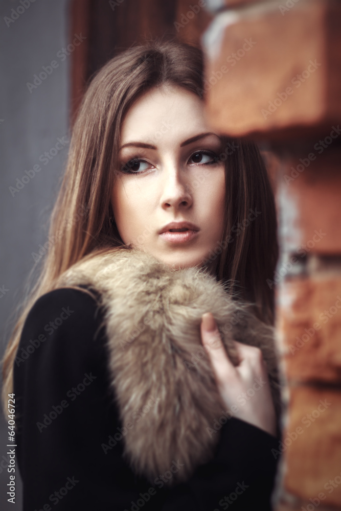 Beautiful young woman in fur style street portrait Beautiful young woman in fur style street portrait