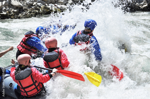 Rafting, splashing the white water
