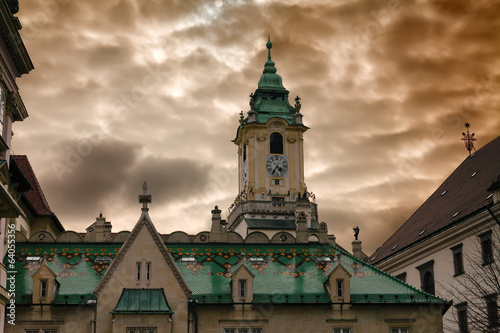 Town hall and dramatic cloudy sky