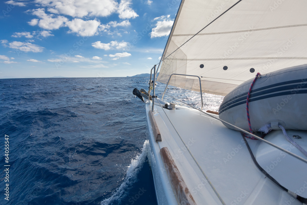 Anchor and furling drum on the yacht bow in sea Anchor and furling drum on the yacht bow in sea