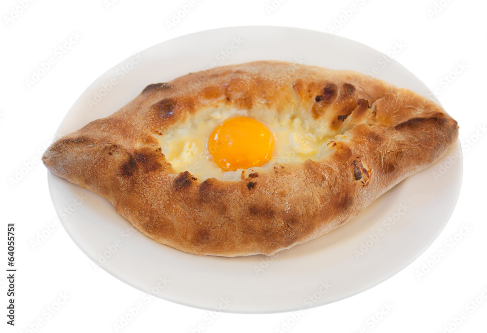 Ajarian khachapuri on the dish isolated on white background