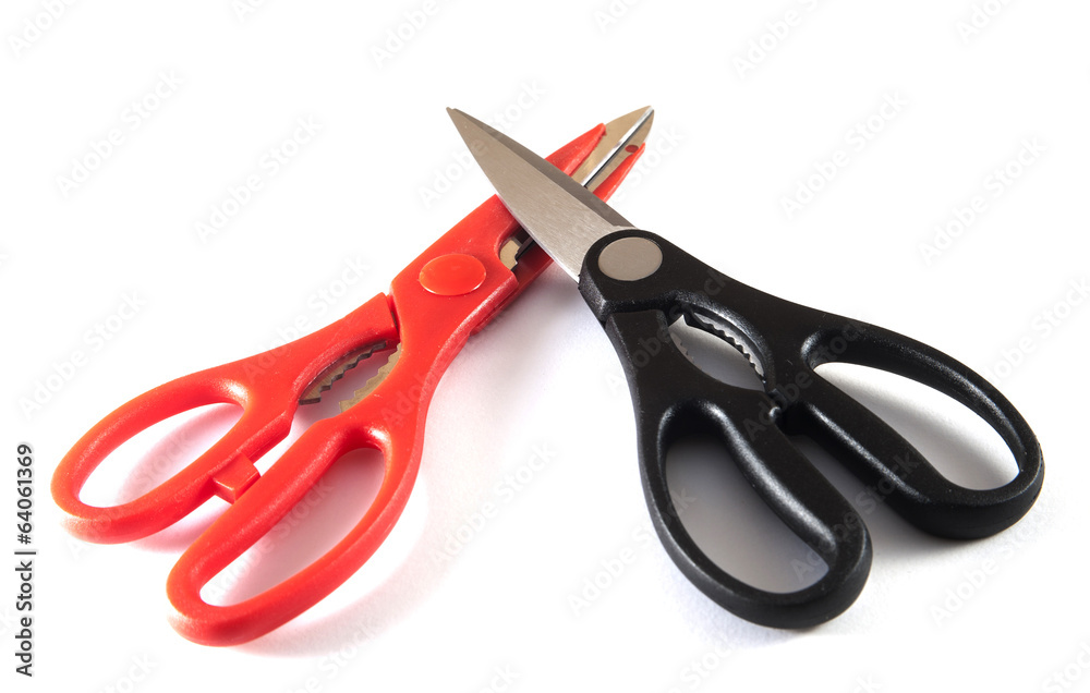Obraz premium Red and black closed scissors