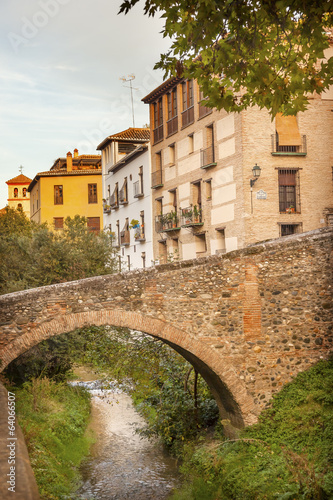 Fototapeta Naklejka Na Ścianę i Meble -  Old Bridge Walking Street River Rio Darro Albaicin Granada