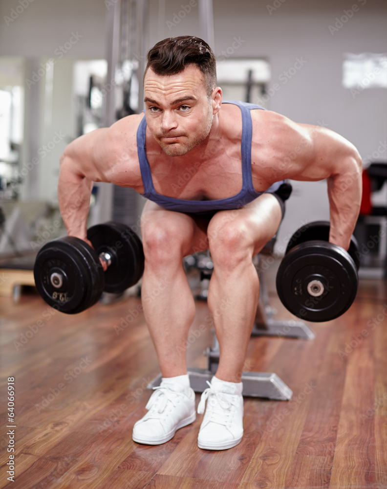 Man working with dumbbells Man working with dumbbells