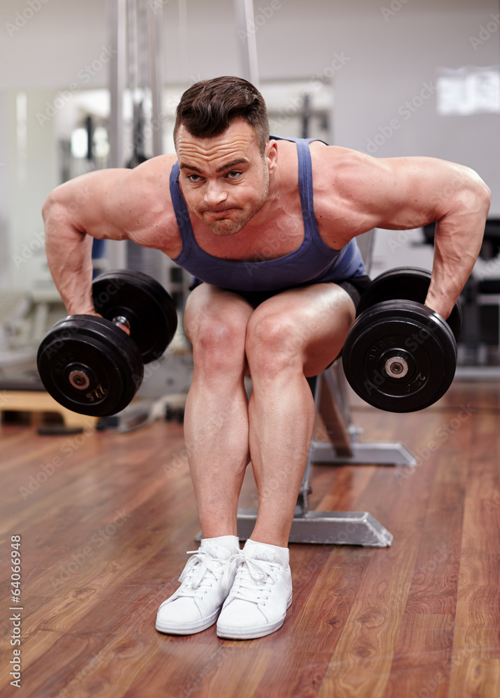 Man working with dumbbells Man working with dumbbells