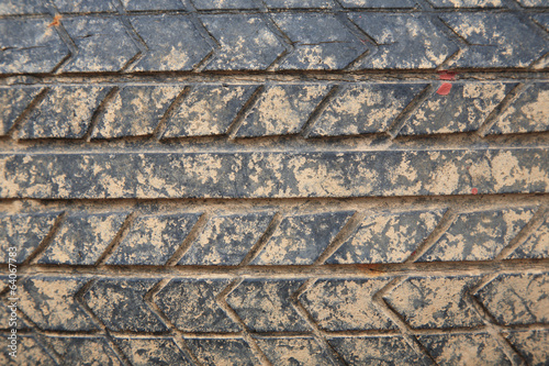 Grunge crack car tire with laterite dirt