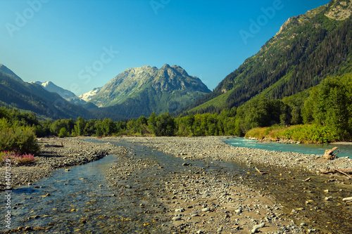 mountain river in a valley photo