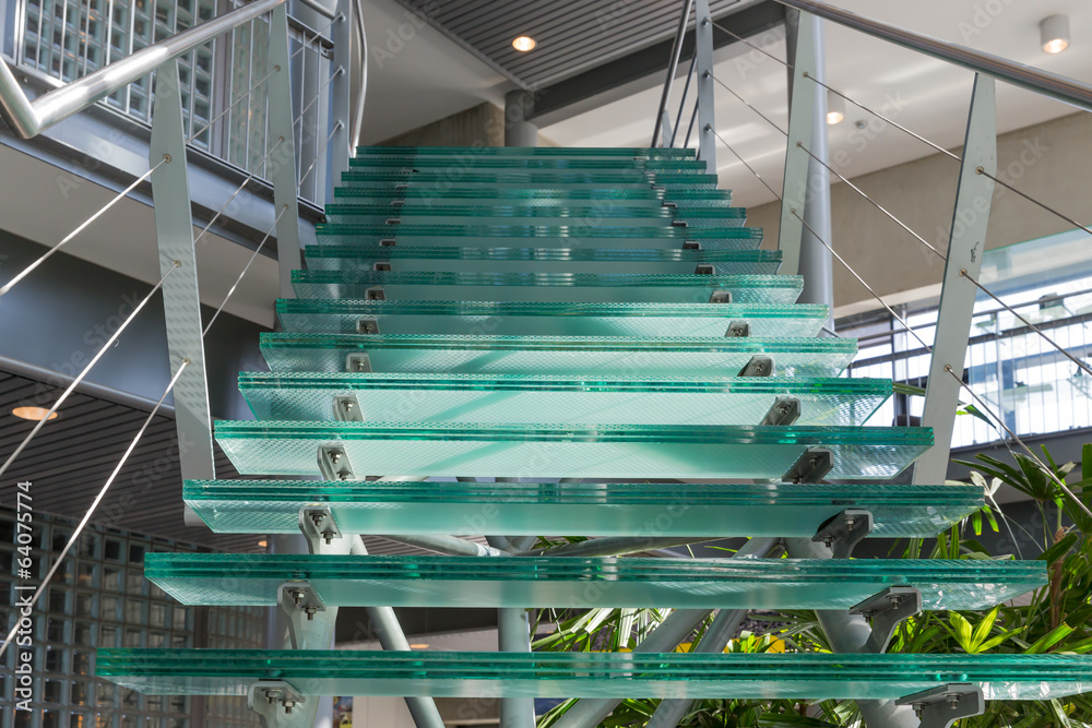 Glass stairway in a modern office building - obrazy, fototapety, plakaty 