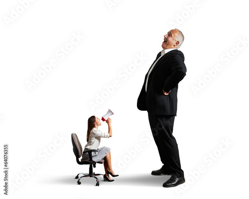 Fotografija woman screaming at big laughing man