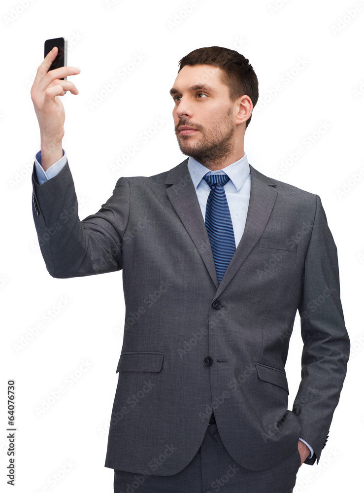 young businessman with smartphone young businessman with smartphone