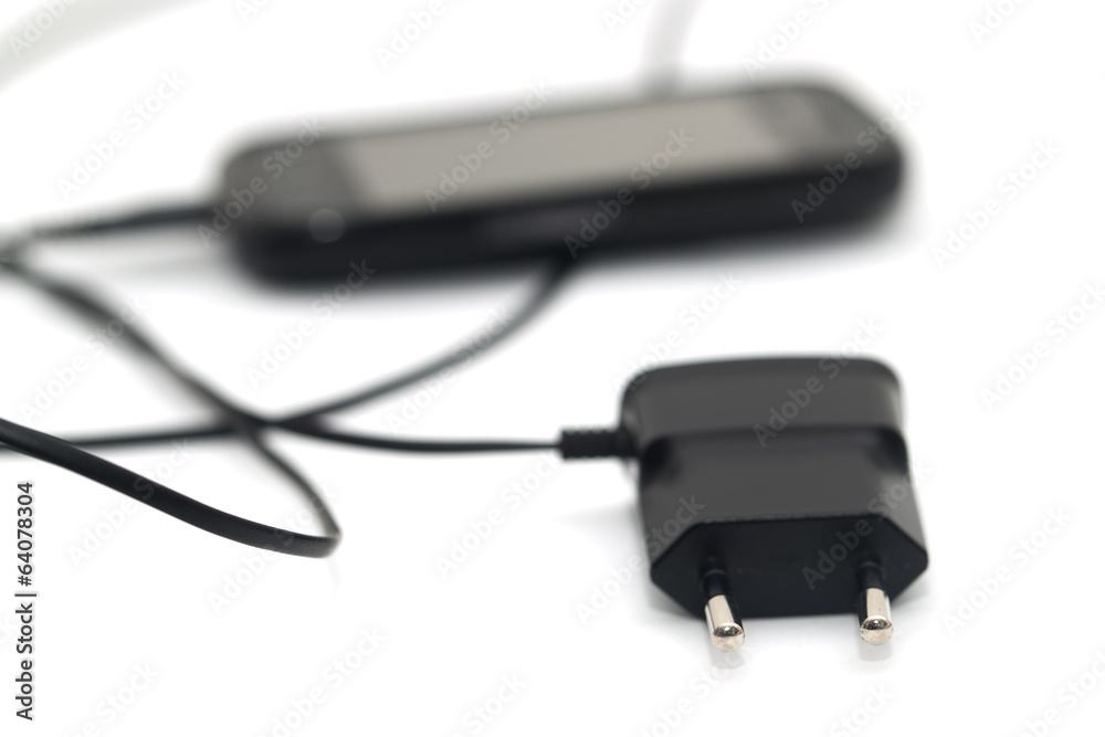 phone with an adapter on a white background phone with an adapter on a white background