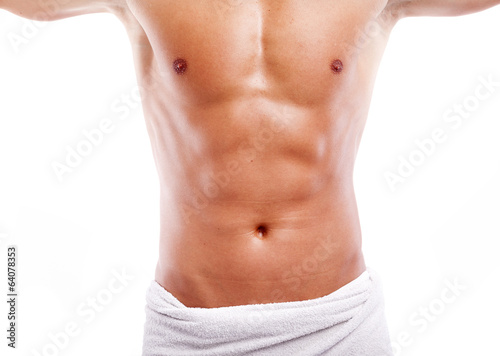 Fotografie Handsome muscular man in towel, isolated on white