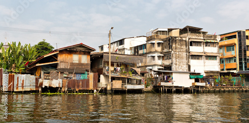 Photography Slum on dirty canal in Thailand