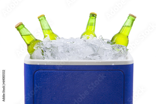 Beer bottles in ice box isolated photo