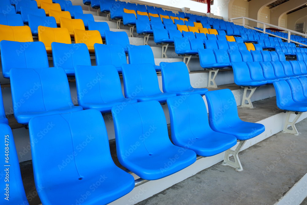 Fototapeta premium Empty bright blue stadium seats