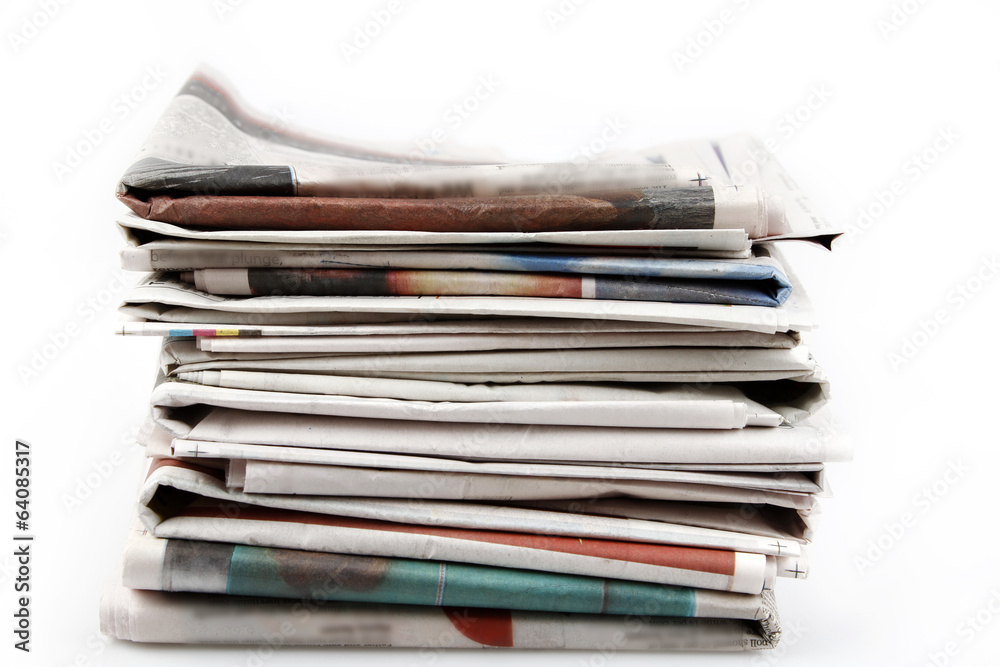 Pile of newspapers isolated on white 