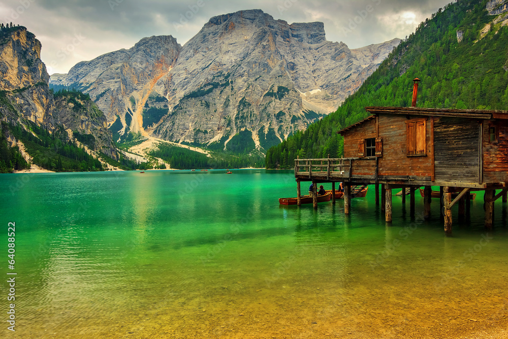 Boathouse at the Braies Lake on a cloudy day,Dolomites,Italy