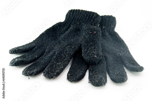 Black  knitted gloves, isolated on white photo