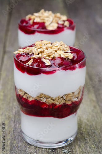 layered dessert with yogurt and granola cherry