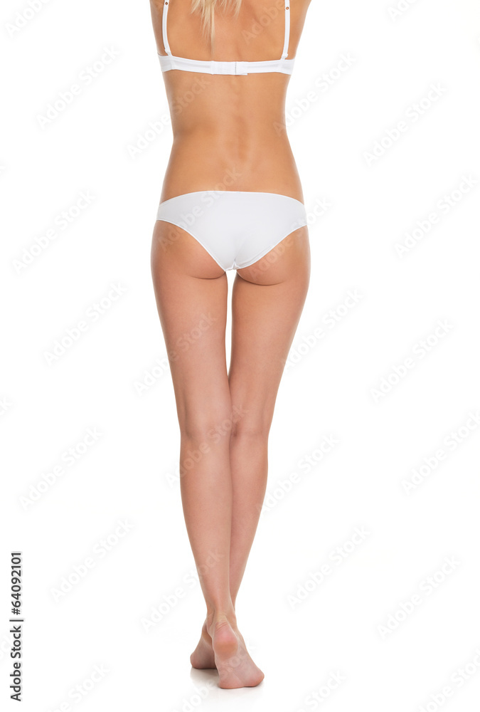 Closeup on young woman in lingerie. rear view Closeup on young woman in lingerie. rear view