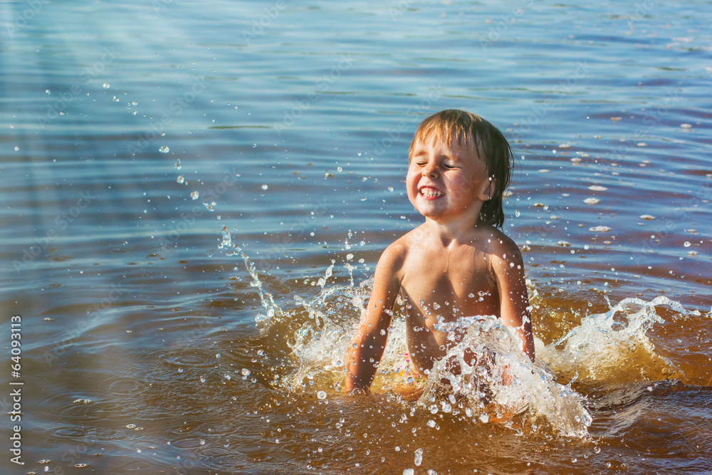 girl swims and playing on the sea girl swims and playing on the sea