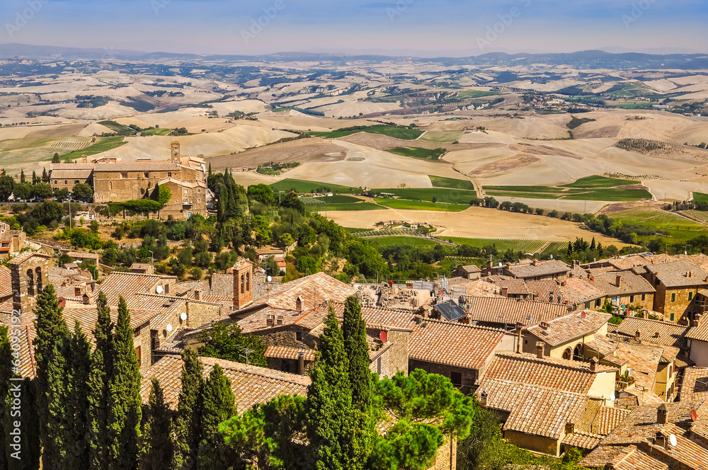 Landscape view of Montalcino town, fields and meadows