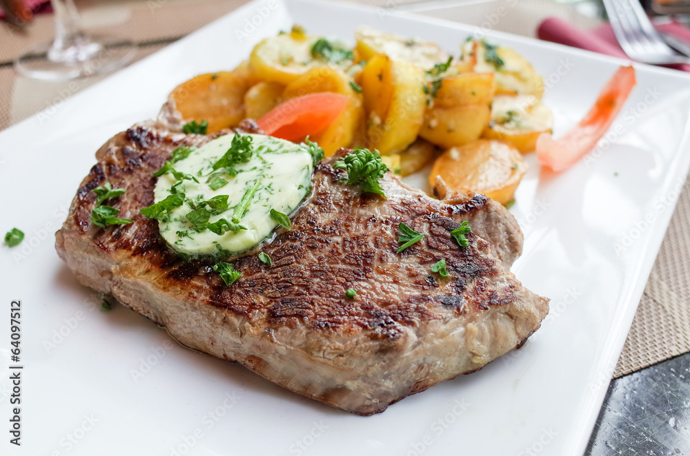 steak beef meat with tomato and french fries