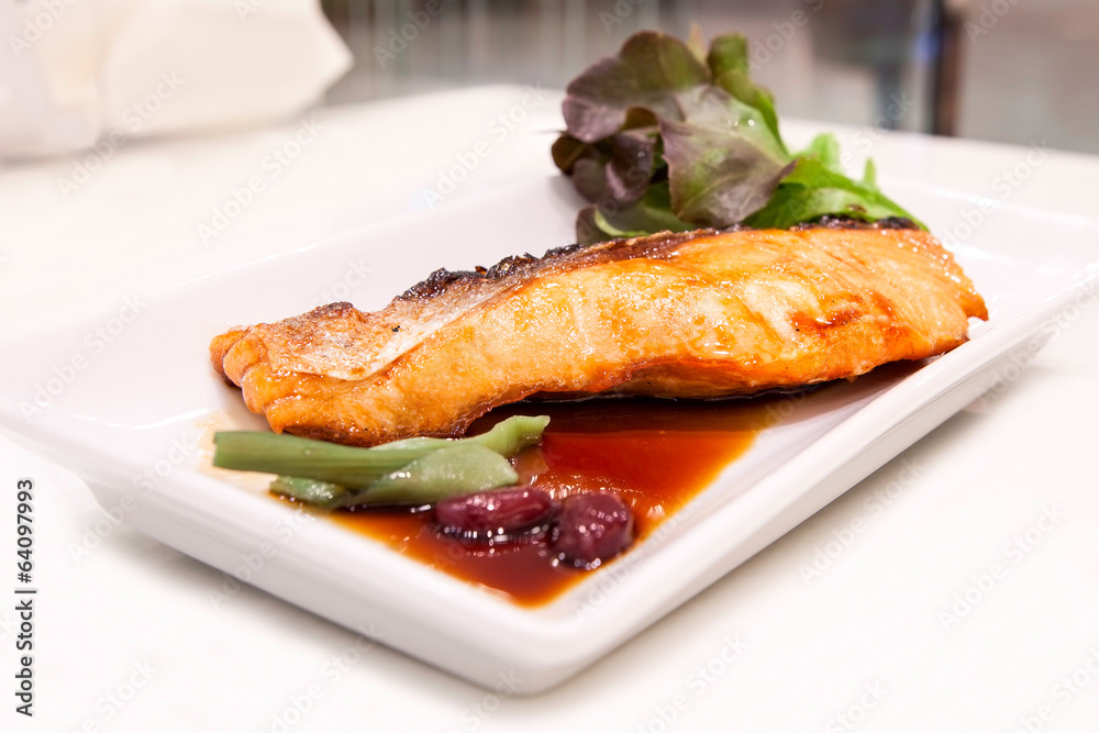 Grilled salmon with teriyaki sauce on the table Grilled salmon with teriyaki sauce on the table