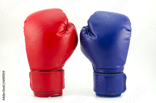 Pair of red and blue leather boxing gloves isolated on white © piyathep