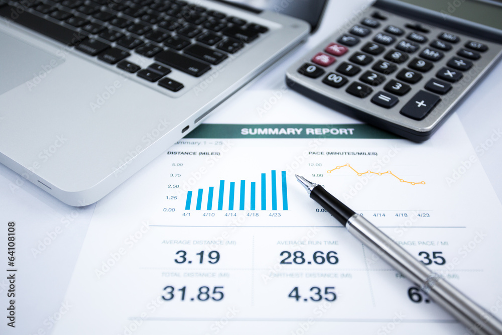 Businessman analyzing investment charts with laptop Businessman analyzing investment charts with laptop