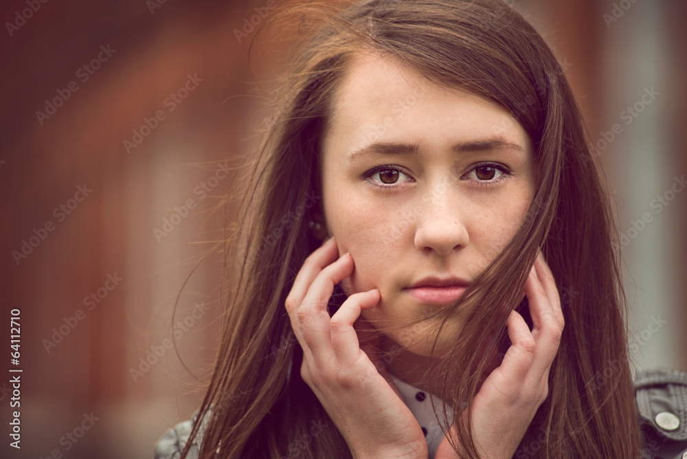 Attractive young woman staring at the camera Attractive young woman staring at the camera