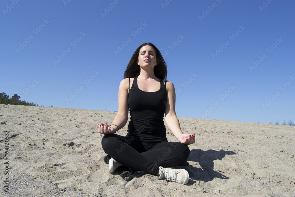 Woman - yoga - beach - meditation - healthy lifestyle & wellness Woman - yoga - beach - meditation - healthy lifestyle & wellness