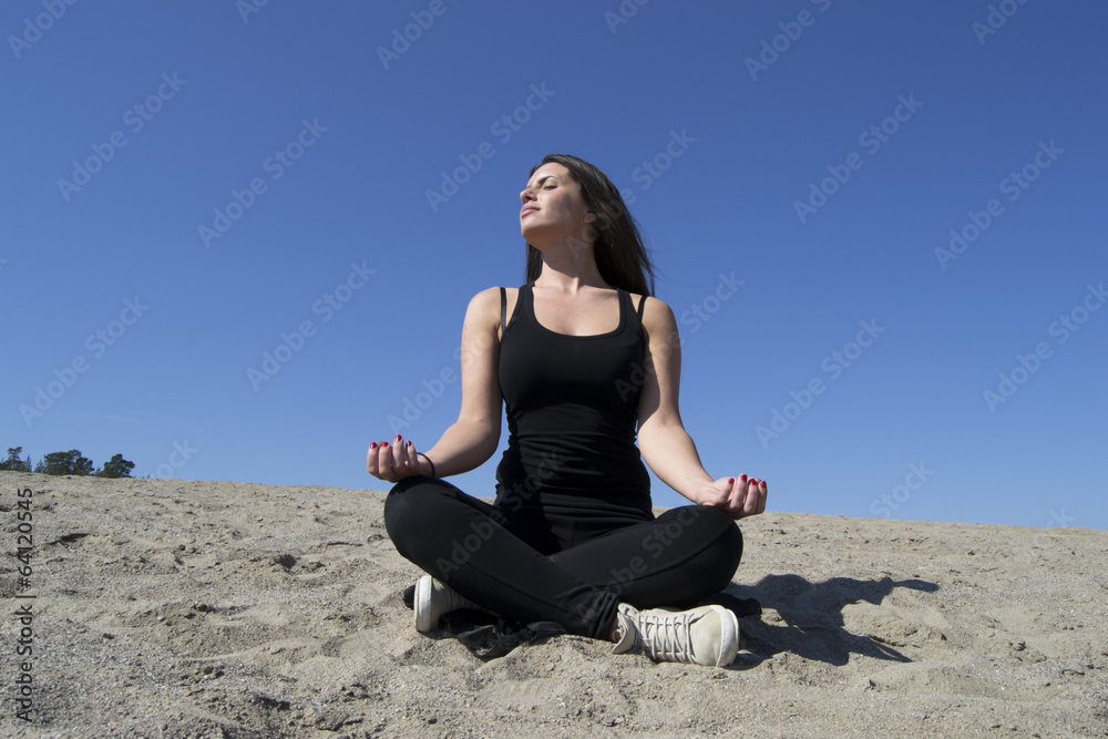 Woman - yoga - beach - meditation - healthy lifestyle & wellness