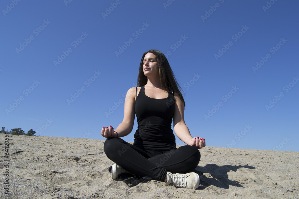 Woman - yoga - beach - meditation - healthy lifestyle & wellness