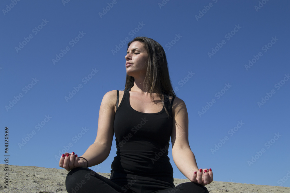Woman - sand - beach - meditation - healthy lifestyle